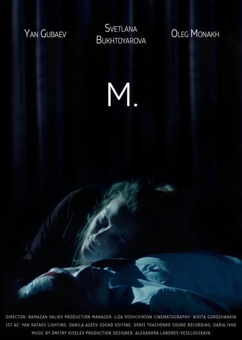 M.